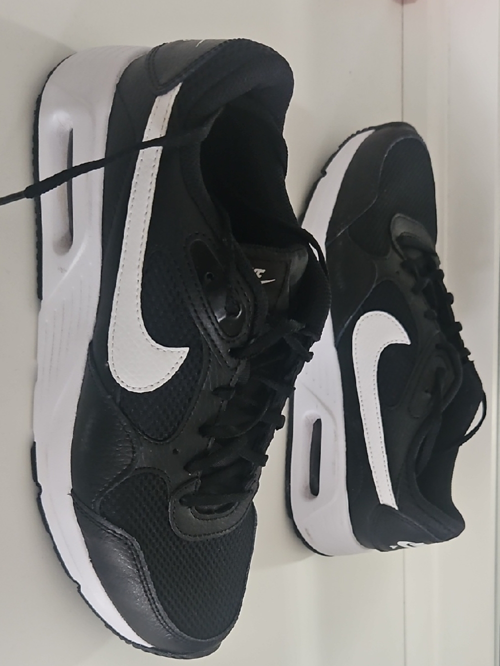 Nike Black and White Running Sneakers with White Swoosh